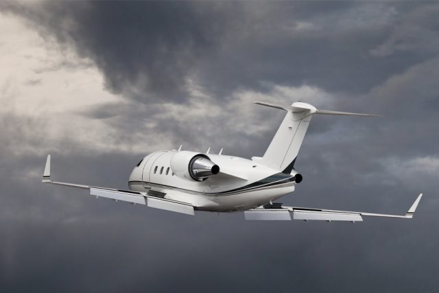 Jet flying away into cloud sky