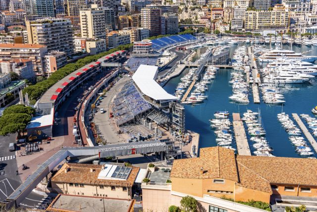 Boats docked in a harbor at an event